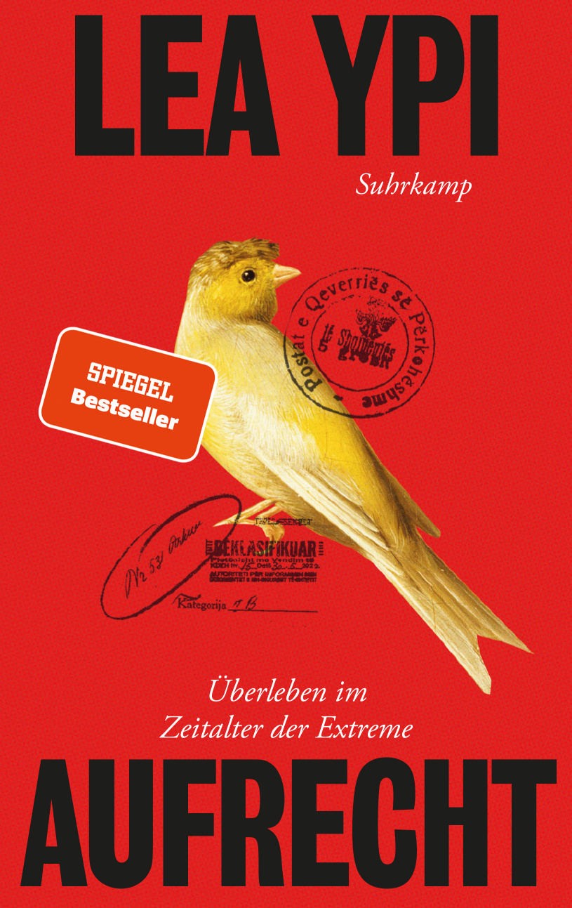 auf rotem Untergrund in schwarz der Titel und der Name der Auorin, mittig ein gelber Kanarienvogel, darüber ein Poststempel und darunter ein weiterer Stempelabdruck in albanischer Sprache