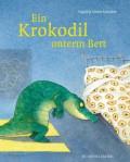 Ein Krokodil schaut unters Bett